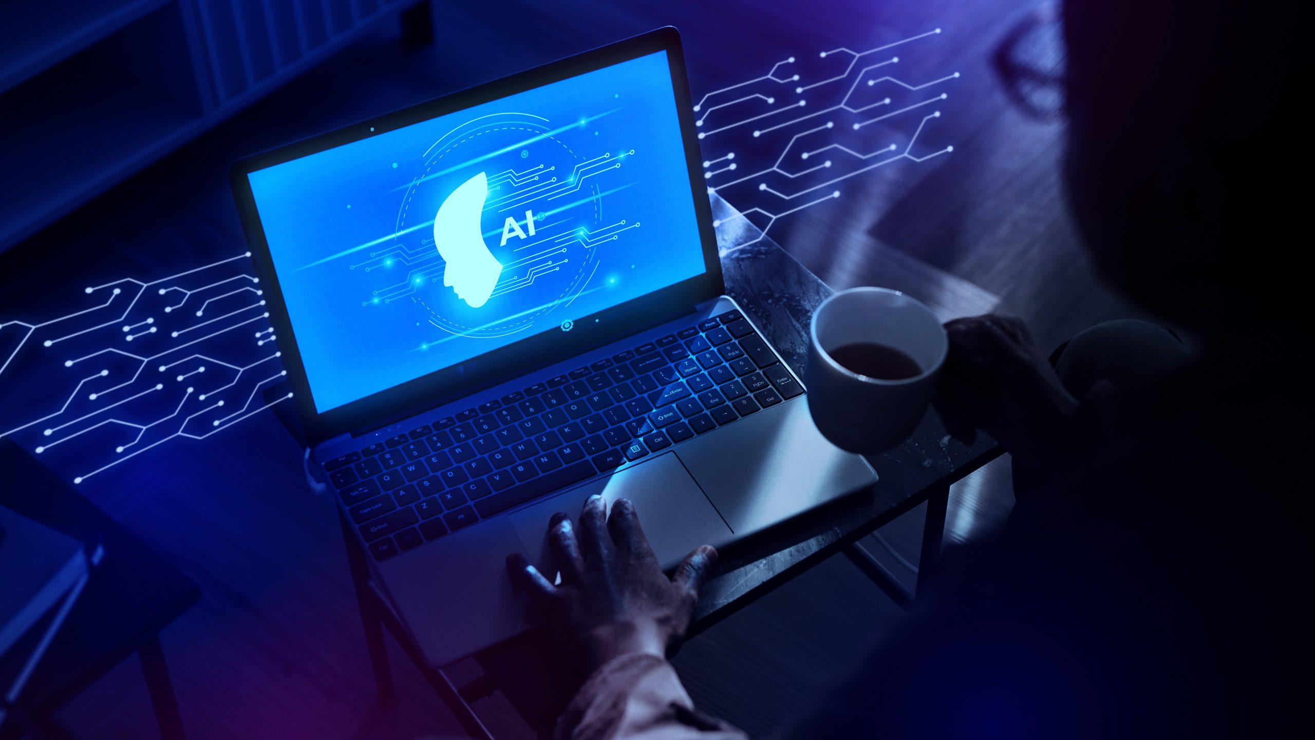 person using a laptop, illustrating AI-enhanced cybersecurity as a shield against evolving threats